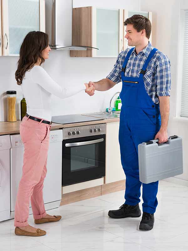 Oven Repair Perth for residents in the Perth, Western Australia Region. Trustworthy repairman talking providing oven repair in her house or home.